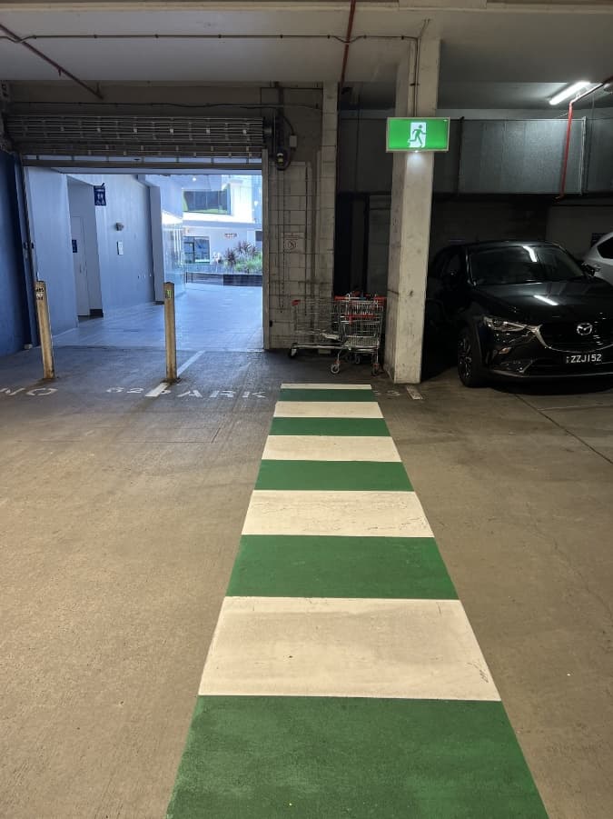 Green and white pedestrian crossing at the Australia Fair carpark exit