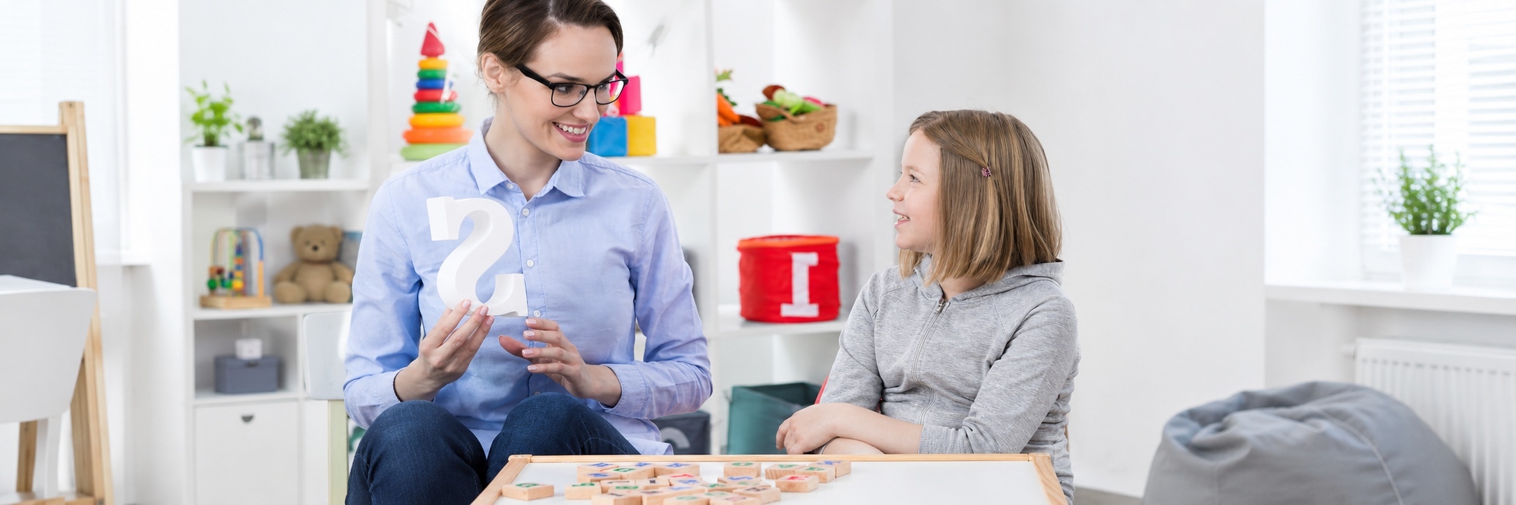 Speech pathologist working with a client on communication skills at Global Rehabilitation Service